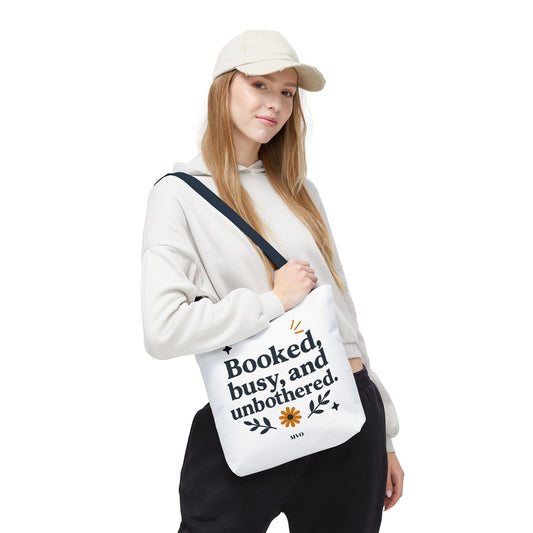 Booked, busy, and unbothered. | Tote Bag
