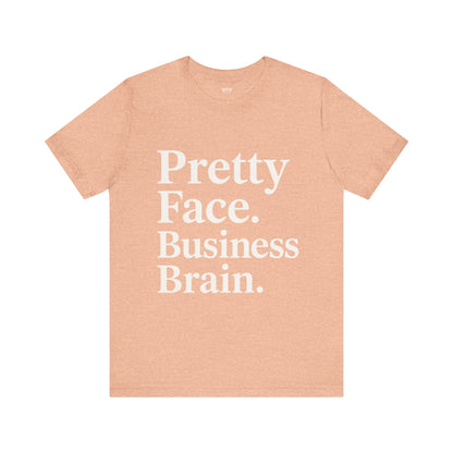 Pretty Face. Business Brain. | Unisex Short Sleeve Tee